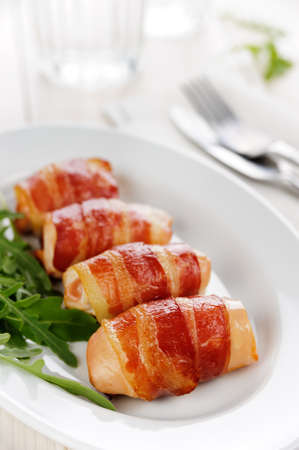 Chicked with grilled baconの写真素材