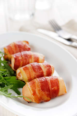 Chicken fillet with grilled baconの写真素材