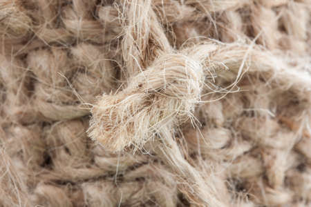 A knot of jute string isolated from the background. An ecological, natural product.