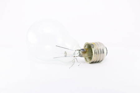 Broken Light bulb on a white backgroundの写真素材