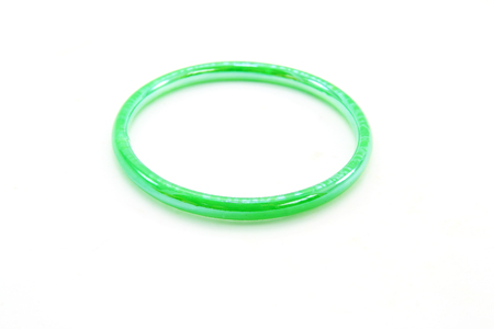 Green bangle on white backgroundの写真素材
