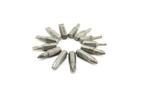 Old screwdriver bits isolated on white backgroundの写真素材