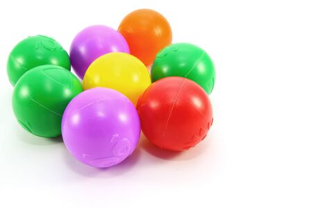 Colorful plastic balls on white backgroundの写真素材