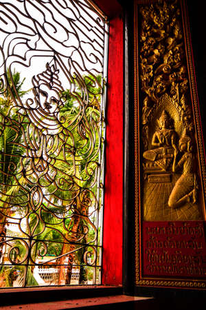 Beautiful Lao temple windowの写真素材