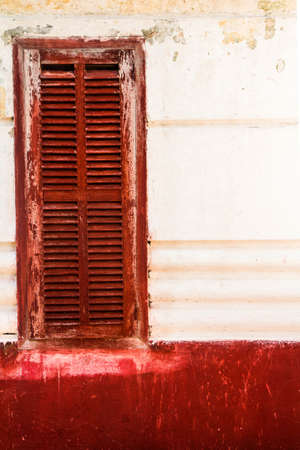 ancient red windowの写真素材