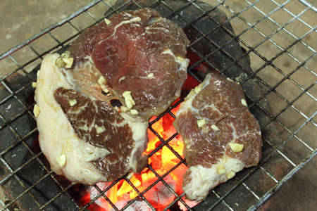 Grilled brisket on stove with grilling panの写真素材