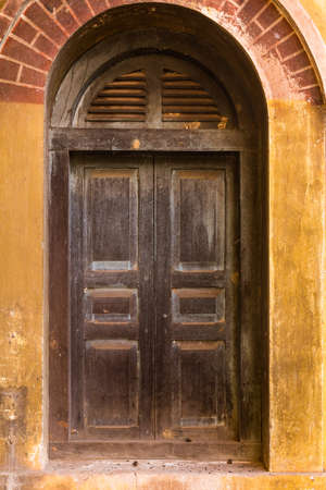 Vintage windows on old brick wallの写真素材
