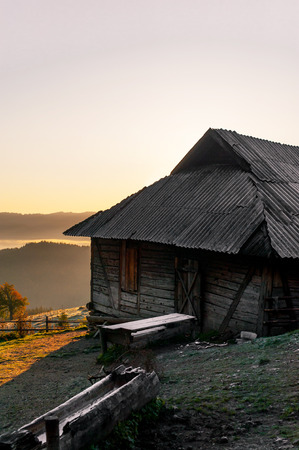 The sunrise and the view of the mountain landscape, the house among the mountainsの写真素材