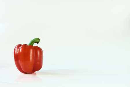 Red paprika on the white background