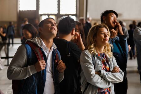 TURKEY, ISTANBUL - 9 OCTOBER, 2018: Tourists are watching at the image of Jesus on the wall inside of Hogia Sophia Museum.のeditorial素材