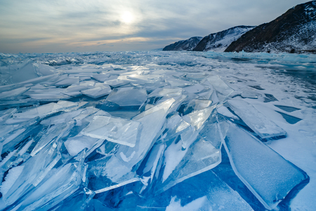 Many cracked blue icicles at Baikal lakeの写真素材