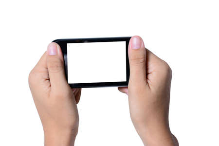Modern mobile phone in a hand isolated の写真素材