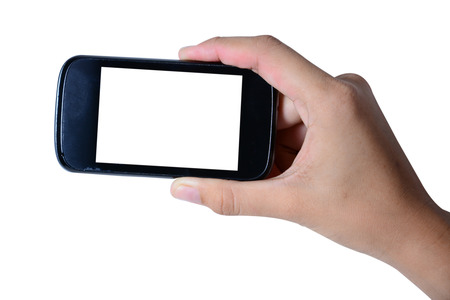 Modern mobile phone in a hand isolatedの写真素材