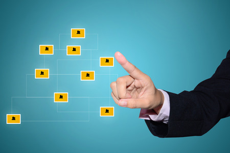 businessman pointing to bargraph の写真素材