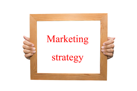 Marketing strategy on a wooden boardの写真素材