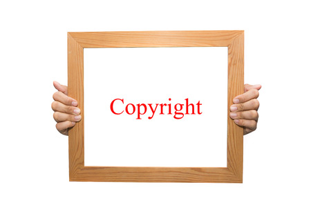 Copyright on a wooden boardの写真素材