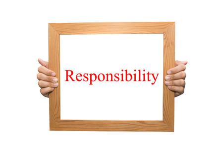 Responsibility on a wooden boardの写真素材