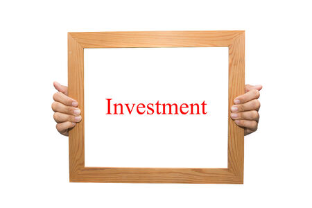 Investment on a wooden boardの写真素材