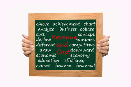 Writing revenue and cost concept の写真素材