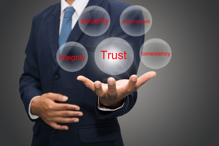 business man writing trust building concept