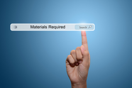 Business and technology, searching system and internet concept - male hand pressing Search Materials Required button. の写真素材