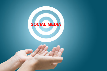 businesswoman hands holding sign with SOCIAL MEDIA