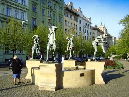 Fountain and Monument musicians in Prague. Fontana is located in the park between the old buildings and the city is that tourists visit.のeditorial素材