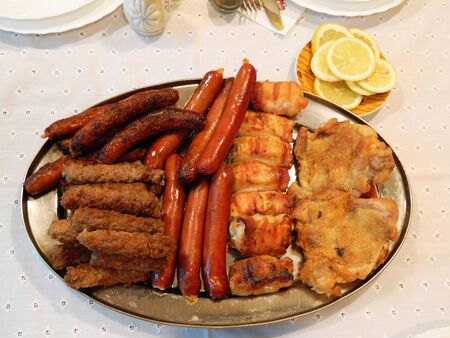 Mixed meat served at the table for the birthday celebration.の写真素材