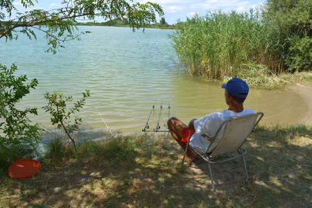 Fisherman on the lake.の写真素材