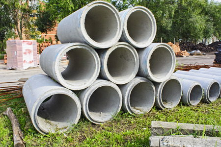 The round concrete pipes at the depot waiting for customers.の写真素材
