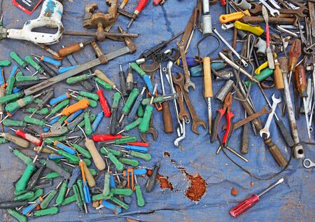 Many of the old tools and the keys to the flea market is waiting for customers.の写真素材