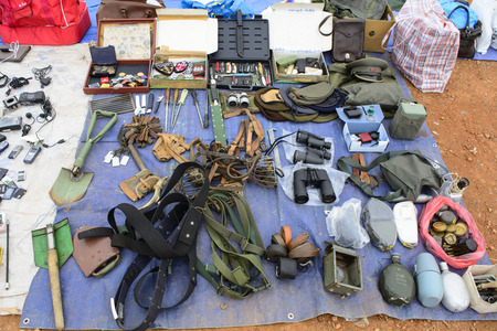 Selling a variety of old military equipment at the flea market.の写真素材