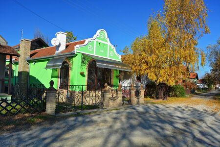 Typical Banat house lit by the autumn sun.の写真素材