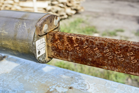 The tab on the old scale which is in stock building materials.の写真素材