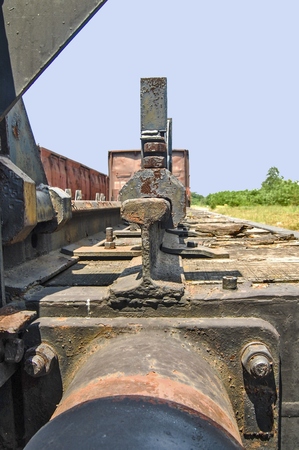 Old railway wagon on siding and waiting to cassation or repair.の写真素材