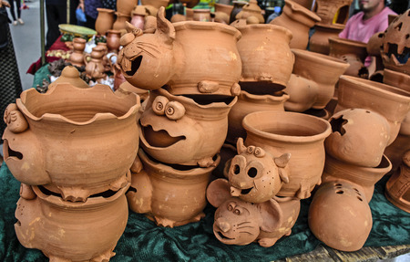Traditional street sales of various decorative clay flowerpot.の写真素材