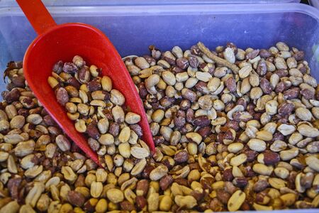 Sales of fresh and tasty peanut in the market.の写真素材