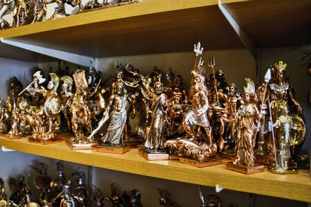 ATHENS, GREECE, JUN 04, 2016.One of the many souvenir shops in the Greek capital of Athens. On the shelf are mythological figures of the Greek gods.のeditorial素材