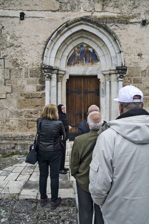 Gradac Monastery, Serbia, May 04, 2019. A group of tourists expects to enter the monastery, which was erected in the second half of the 13th century (ca. 1275), on the remains of a former church.のeditorial素材