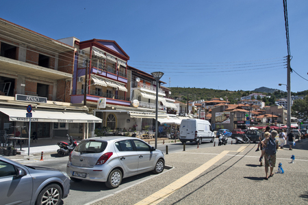 Neos Marmaras, Greece, May 30, 2019. Beautiful and quiet coastal street and amenities that are in the same.のeditorial素材
