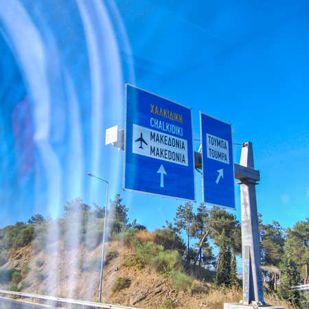 Thessaloniki, Greece, June 01, 2013. Travel through Greece and view of passengers through the front glass of a double deck bus.のeditorial素材