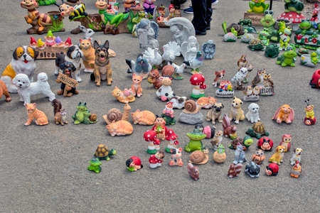 Zrenjanin, Serbia, July 04, 2020. Merry plaster figurines that are sold on the market for everything as well as for antiques.のeditorial素材