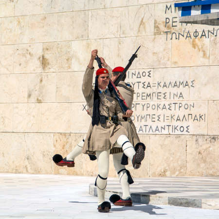 Athens, Greece, June 04, 2016. Evzoneses (presidential guards) are watching over the monument to the Unknown Soldier in front of the Greek Parliament building in Syntagma Square. The ceremony of changing the guard in front of the parliament.のeditorial素材