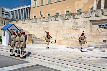 Athens, Greece, June 4, 2016. Euzons (presidential guards) are watching over the monument to the Unknown Soldier in front of the Greek Parliament building in Syntagma Square. Change of guard.のeditorial素材