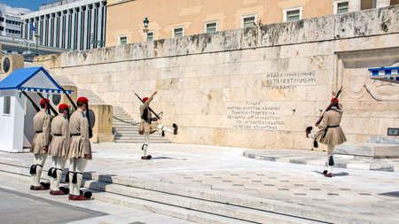 Athens, Greece, June 4, 2016. Euzons (presidential guards) are watching over the monument to the Unknown Soldier in front of the Greek Parliament building in Syntagma Square. Change of guard.のeditorial素材