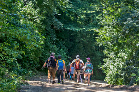 Vrsac, hill, Serbia, June 27, 2020. A walk of a group of tourists along the Vrsac hill. They walk to the mountain lodge.のeditorial素材