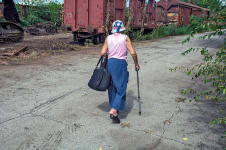Zrenjanin, Serbia, August 31, 2020. Grandma, an older lady goes shopping and walks every day.のeditorial素材