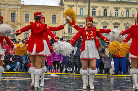 Zrenjanin, Serbia, January 12, 2019. A group of young majorettes rehearse on the street. Majorettes represent the traditional carnival of mimosas in Herceg Novi from Montenegro.のeditorial素材