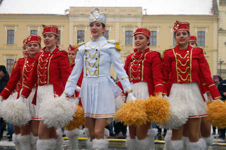 Zrenjanin, Serbia, January 12, 2019. A group of young majorettes rehearse on the street. Majorettes represent the traditional carnival of mimosas in Herceg Novi from Montenegro.のeditorial素材