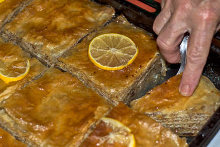 Casserole with freshly baked baklava. This oriental delicacy is very popular with children.の写真素材